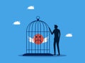 Lack of freedom or happiness in working life. man locks his sadness in a cage Royalty Free Stock Photo