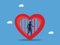 Lack of freedom to make decisions. Block emotions and feelings in heart. Businessman trapped in heart prison