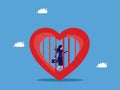Lack of freedom to make decisions. Block emotions and feelings in heart. Businesswoman trapped in heart prison