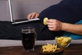 Mindless snacking, overeating, lack of physical activity Royalty Free Stock Photo