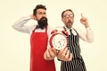 Lack of time. Check what time is it. It is lunch time. Men cooks with alarm clock. Failed deadline. Man bearded hipster