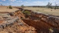 The lack of vegetation has left the soil vulnerable to erosion creating deep trenches and gullies in the landscape