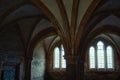 Lacock, England - March 01 2020: Shot of of dark, spooky room in the cloisters at Lacock Abbey Royalty Free Stock Photo