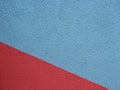 Laconic and expressive image in the form of a red-blue wall. Abstract background image.