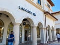 A Lacoste clothing retail store at an outdoor mall