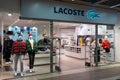 Lacoste store shop in shopping mall, crocodile sign. Minsk, Belarus, 2023