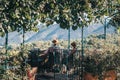 Lacoste, Vaucluse, Provence-Alpes-Cote d`Azur, France, September 25, 2018: Pensioners Europeans in a cafe with magnificent panor