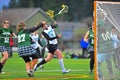 Lacrosse girls shot block night game Royalty Free Stock Photo
