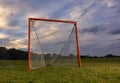 Lacrosse goal with sunset