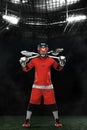 Lacrosse Player, athlete sportsman in red helmet on grand arena background. Sport and motivation wallpaper.