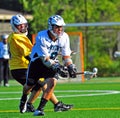 Lacrosse reach for the ball