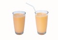 Lactic fermentation beverage color light orange sour taste or yogurt in two type glass tall with straw plastic.