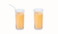 Lactic fermentation beverage light orange sour or yogurt taste in square glass tall with plastic straw