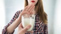 Lactose intolerance. Dairy Intolerant young girl refuses to drink milk