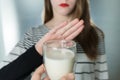 Lactose intolerance. Dairy Intolerant young girl refuses to drink milk