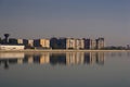 Blocks of flats with reflection in Lacul Morii Royalty Free Stock Photo