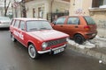 Restored Lada car parked in front of a retro restaurant Royalty Free Stock Photo