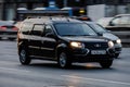 lada largus car moving on the street. Estate vehicle driving along highway in city with blurred background Royalty Free Stock Photo