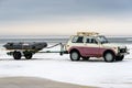 Lada Niva towing trailer and boat