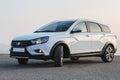 Lada Vesta Cross white car, wagon body.