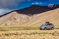 Modern MPV car on road in Himalayas mountains Royalty Free Stock Photo