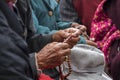 Ladakhi holding wooden rosary beads Royalty Free Stock Photo