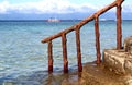 Ladder going down to sea on the background of the boat