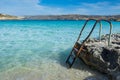 Ladder leading down into a beautiful blue sea