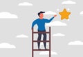 Ladder of opportunity and success. A man stands on a ladder and tries to catch a golden star and good luck. Achievement in their