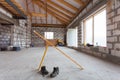 Ladder, parts of scaffolding and construction material on the floor during on the remodeling, renovation, extension, restoration Royalty Free Stock Photo