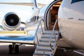 Ladder in a private jet, Business private jet airplane parked at terminal, Luxury tourism and business travel transportation Royalty Free Stock Photo