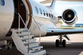 Ladder in a private jet, Business private jet airplane parked at terminal, Luxury tourism and business travel transportation Royalty Free Stock Photo