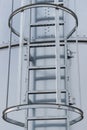 Ladder on silo for storage grain after harvest. Detail of agricultural equipments Royalty Free Stock Photo