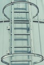 Ladder on silo for storage grain after harvest. Detail of agricultural equipments Royalty Free Stock Photo