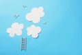 ladder to clouds and wooden planes on blue background, flat layout