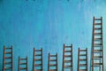 Ladders on blue wall