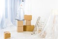 ladders and boxes in new empty apartment Royalty Free Stock Photo