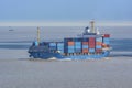 Laden cargo container vessel passes along the fairway of the sea Royalty Free Stock Photo