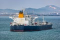 Laden crude oil tanker anchored in outer harbor in front of the Pengerang Deepwater Petroleum Terminal. Johor, Malaysya Royalty Free Stock Photo