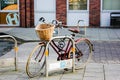 Ladies bike is parked in a special bicycle parking in a small English town