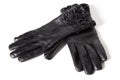 Ladies black leather gloves isolated