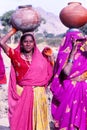 Ladies carrying water jars, Jaisalmer, India