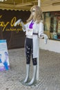 A ladies fashion mannequin on display in a shop doorway on the Strip in the Portuguese holiday resort of Albuferia Royalty Free Stock Photo
