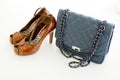 Ladies Leather blue handbag and brown color of high heel shoes i Royalty Free Stock Photo