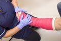 Ladies leg in Cast being treated by a Nurse