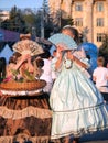 Ladies in medieval dresses in the fan zone attract attention of foreign tourists.