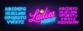 Ladies Night neon lettering on brick wall background. Royalty Free Stock Photo