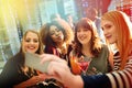 Ladies night out with my lovelies. young friends taking selfies while having drinks at a party. Royalty Free Stock Photo