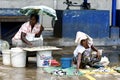 Ladies selling fish and crabs at the Negombo Fish Market in Negombo, Sri Lanka.