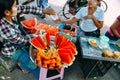 Ladies selling watermelons in Yangon.